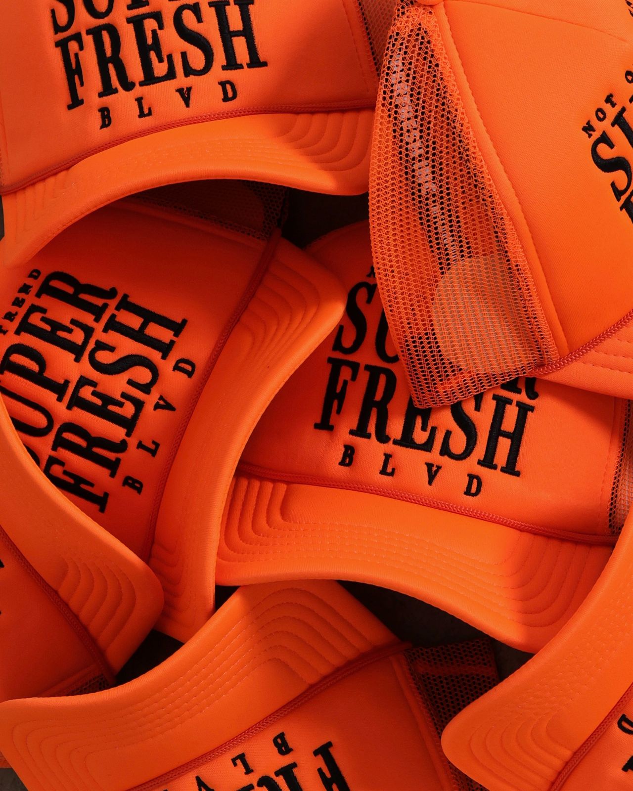 Orange BLVD Trucker Snap