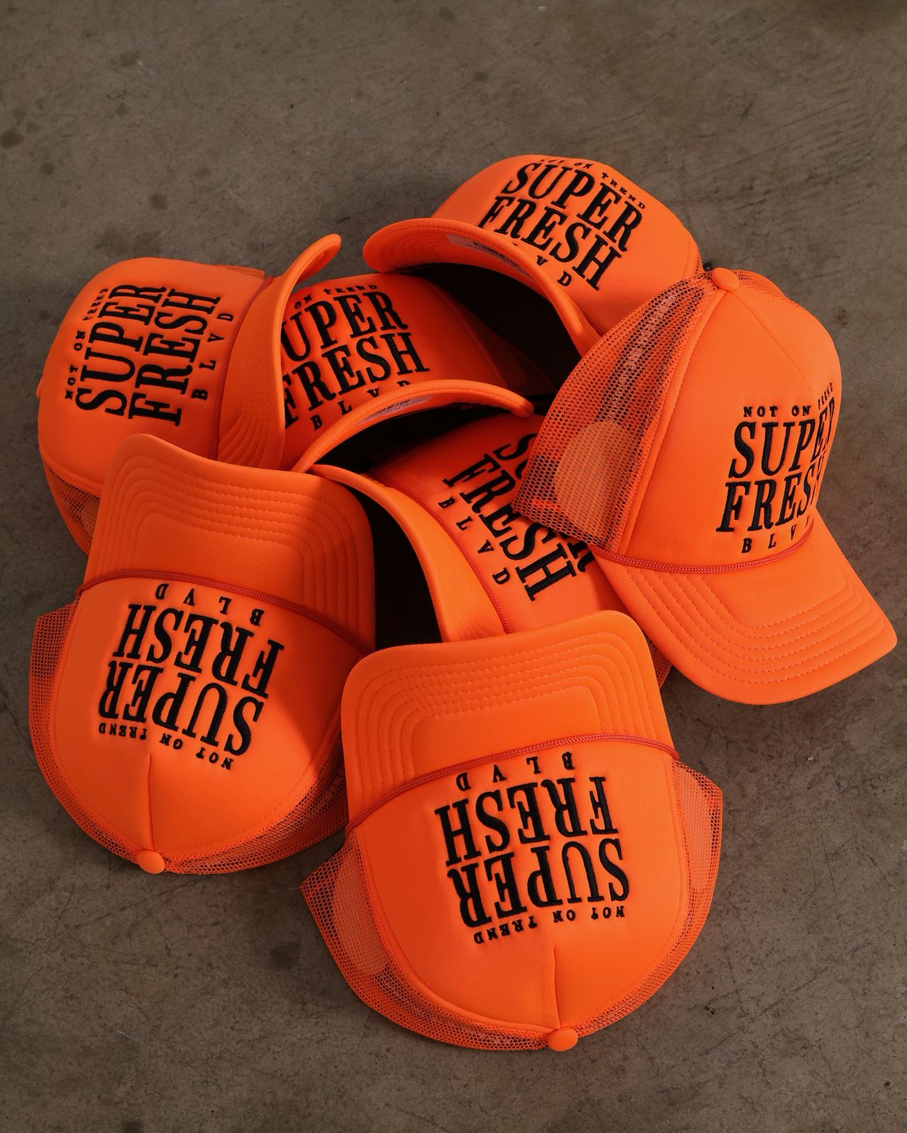 Orange BLVD Trucker Snap