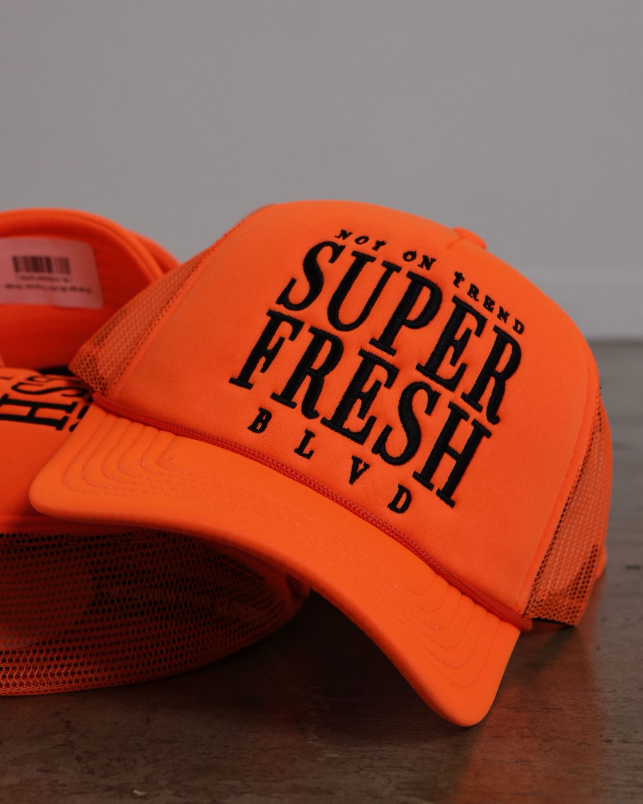 Orange BLVD Trucker Snap