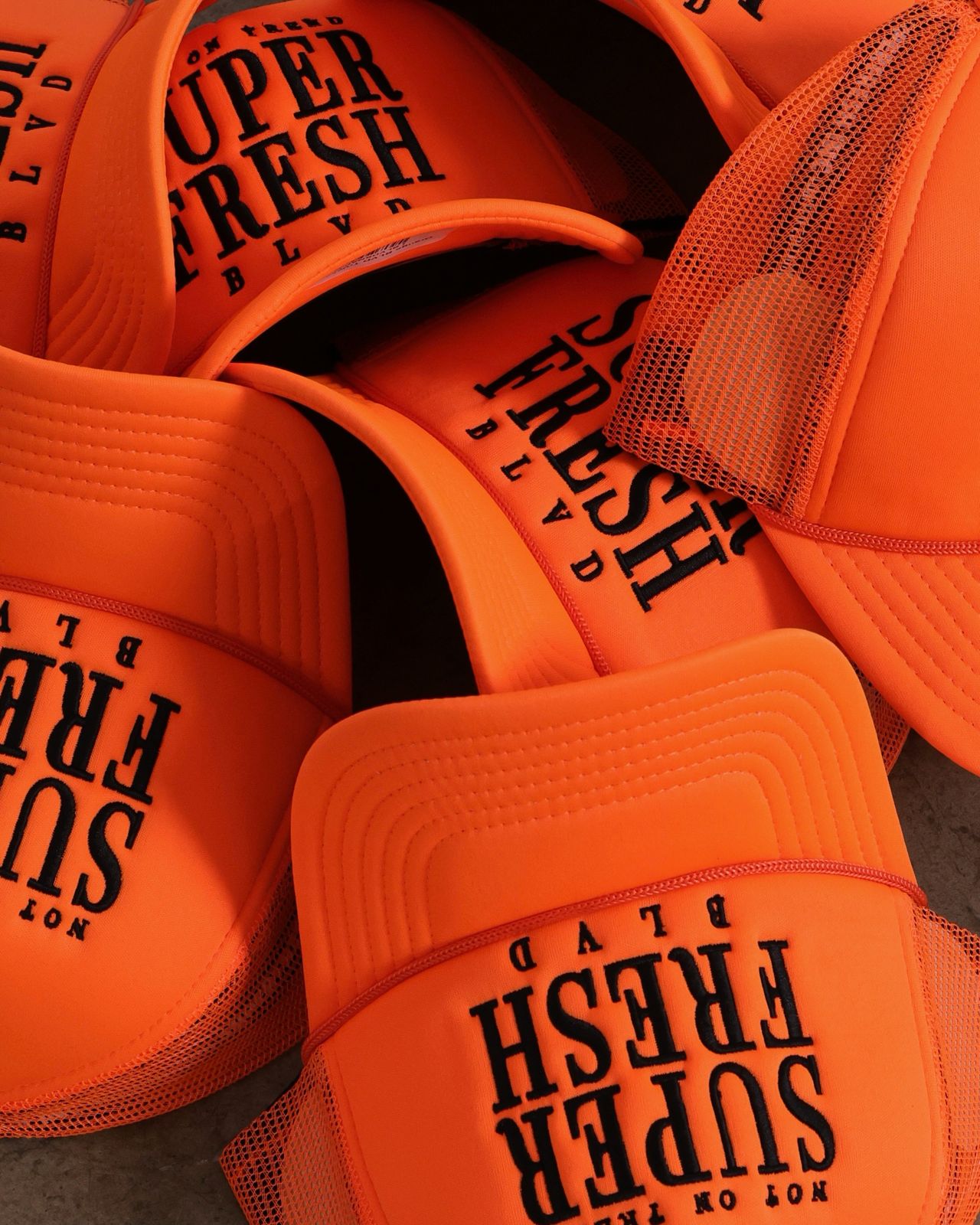 Orange BLVD Trucker Snap